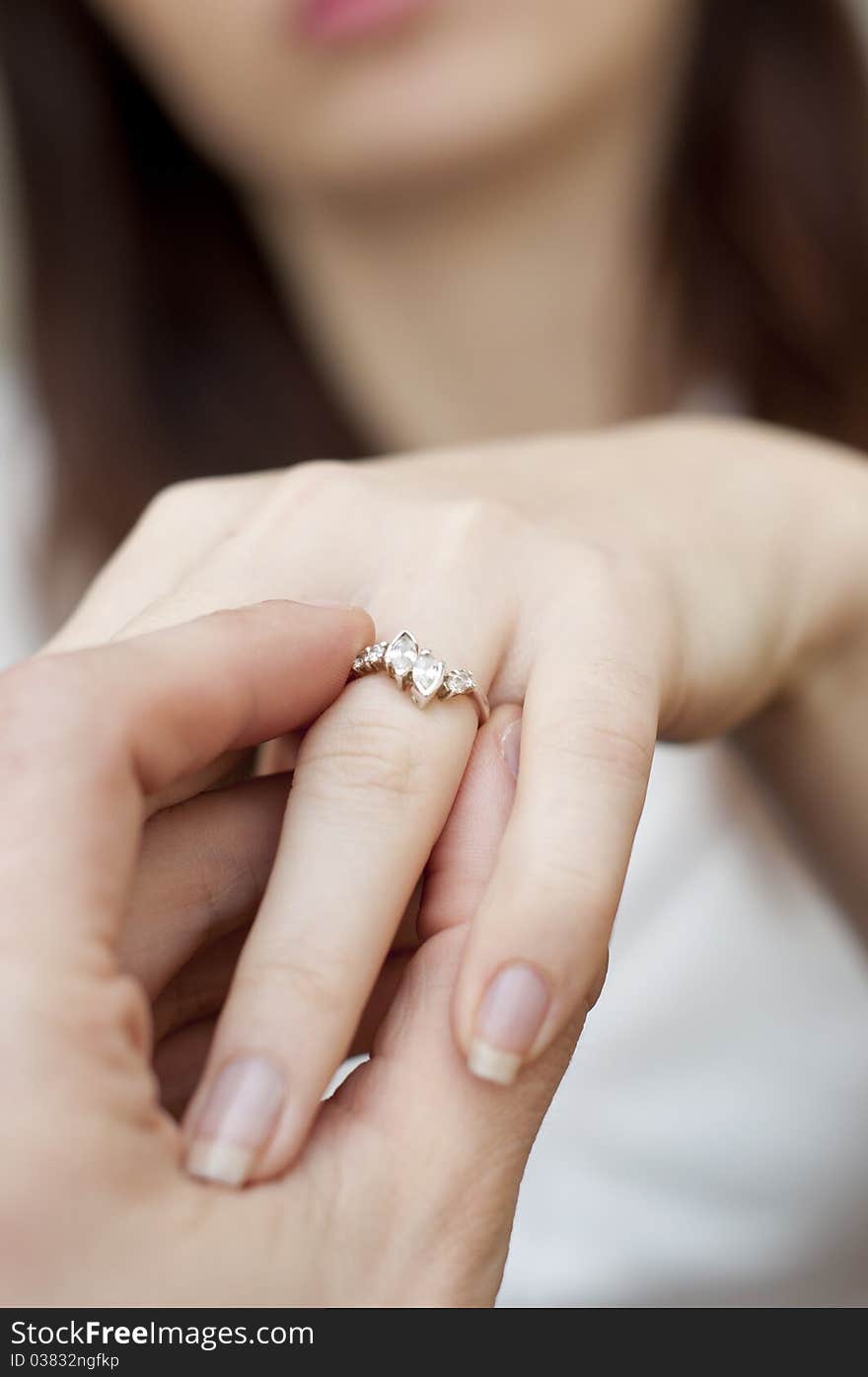 Engagement Ring Into A Finger