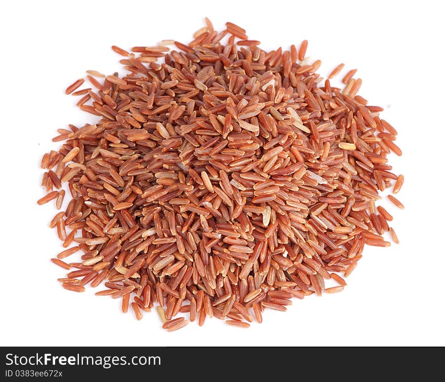 Red rice on white background