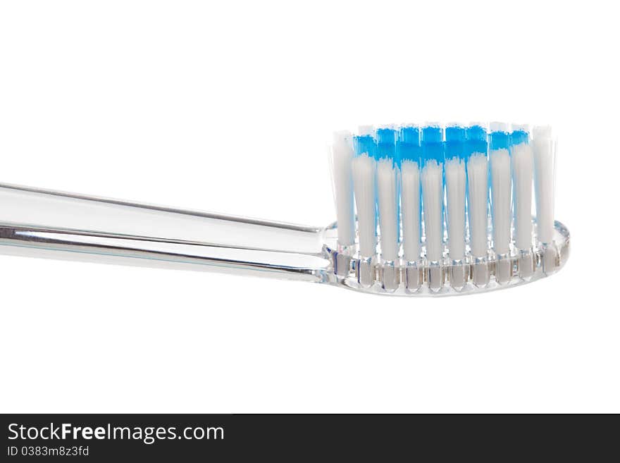 New toothbrush close-up on a white background