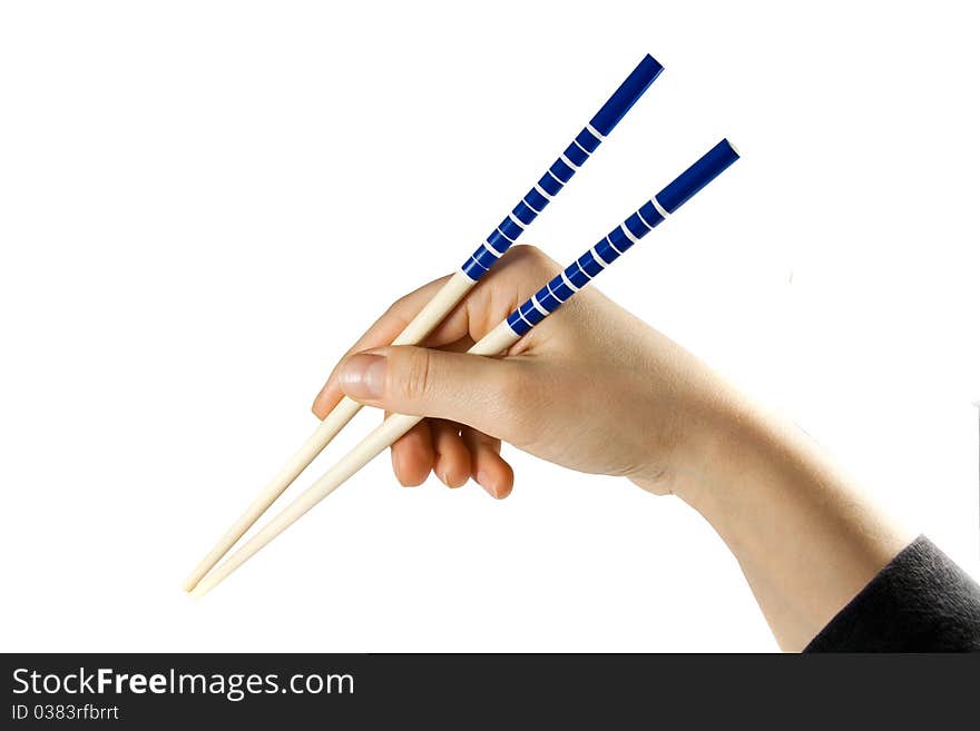 Woman hand with chopsticks isolated on white background