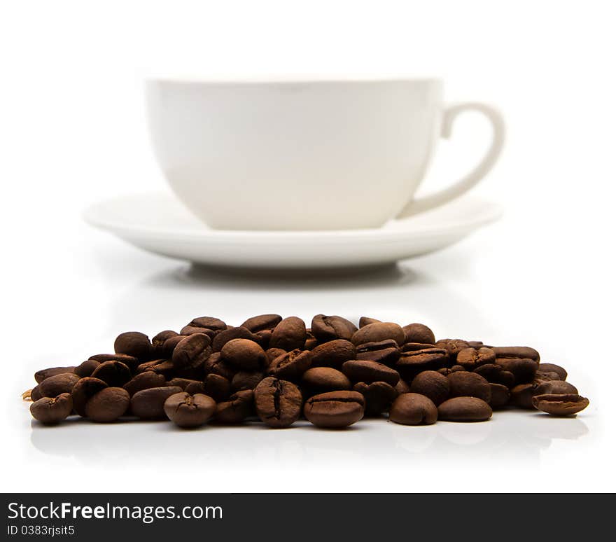 Coffee Cup And Grain On White Background