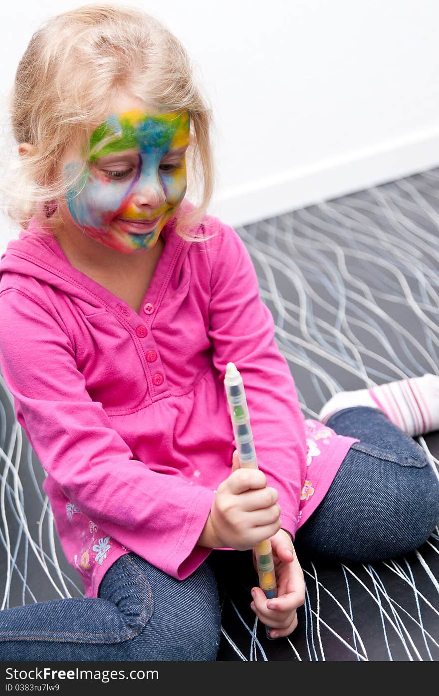 Child Having Her Face Painted