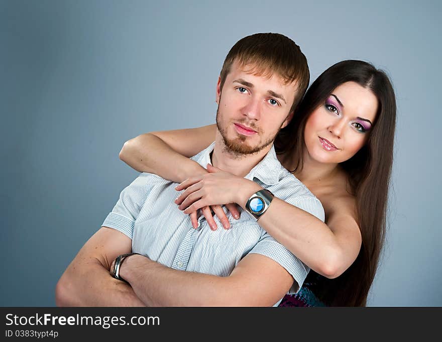 Young couple over white background