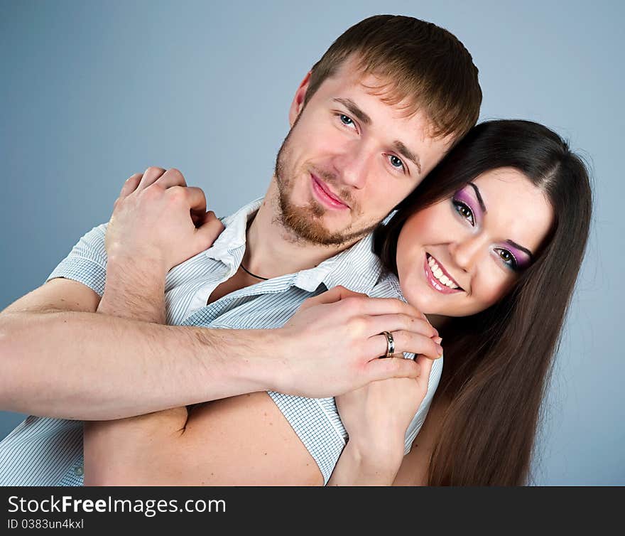 Young couple over white background