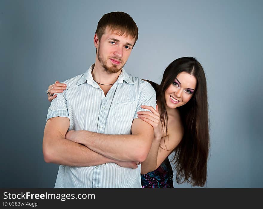 Young couple over white background