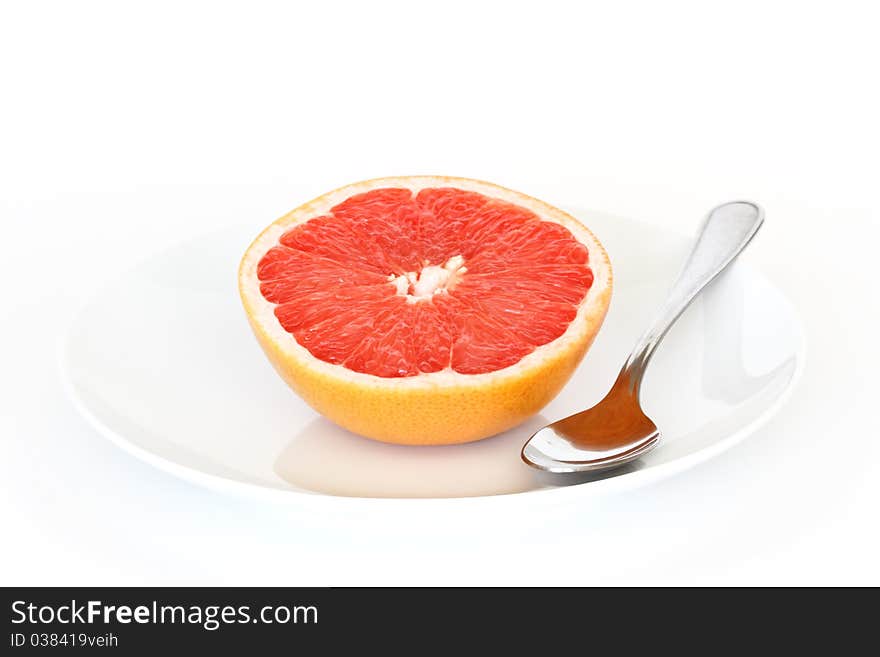 Fresh grapefruit slice on the plate