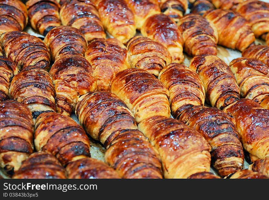 Close up of buns with chocolate on market stand