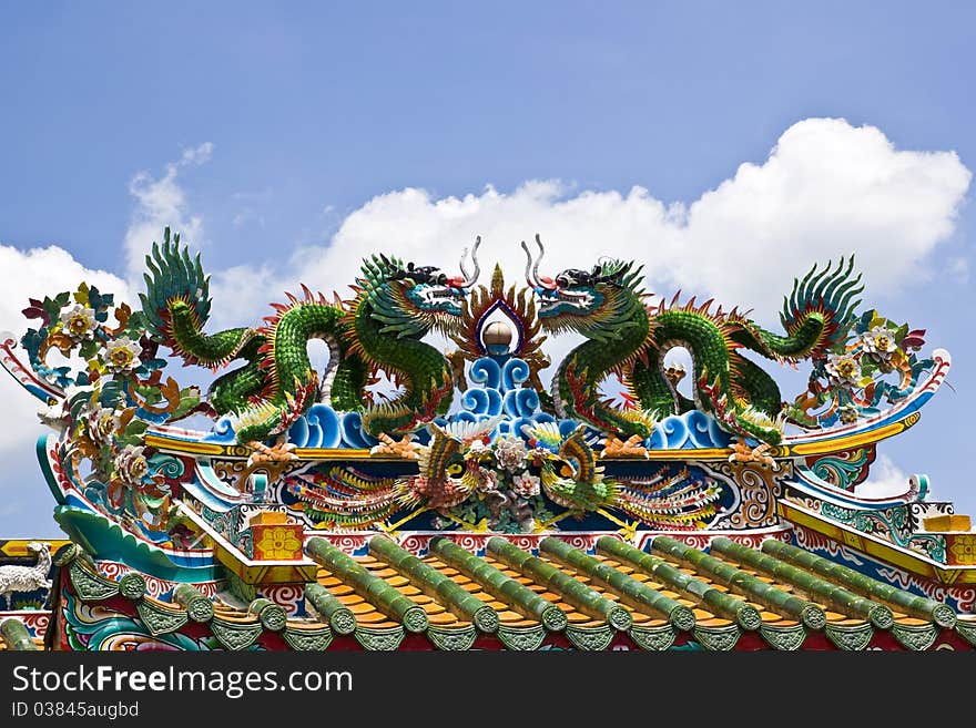 Statue dragon in Chinese style on The roof. Statue dragon in Chinese style on The roof