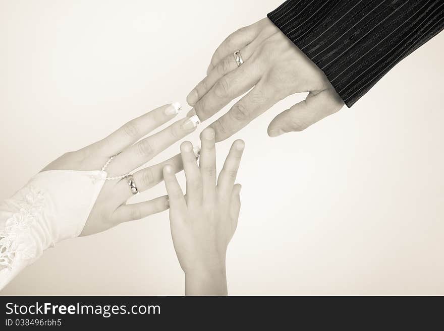 Bride and Groom baby Hands with Wedding Ring