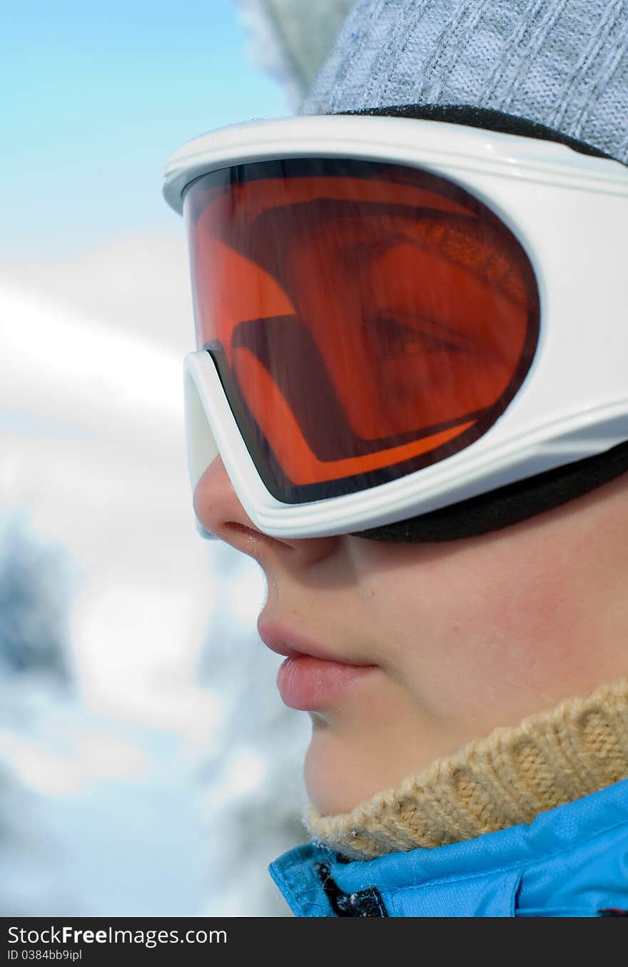 Young woman face in ski mask