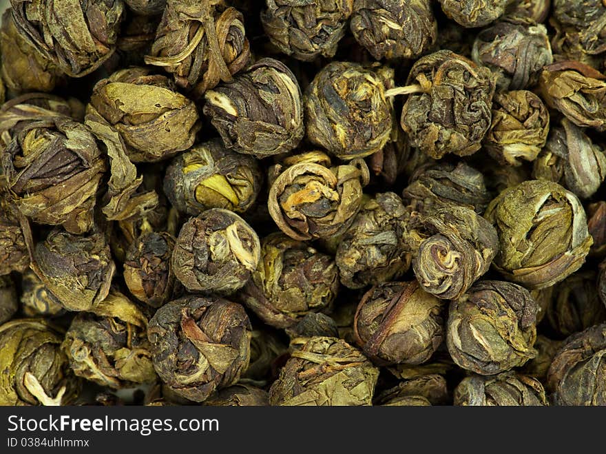 Close-up of green tea dry leaves