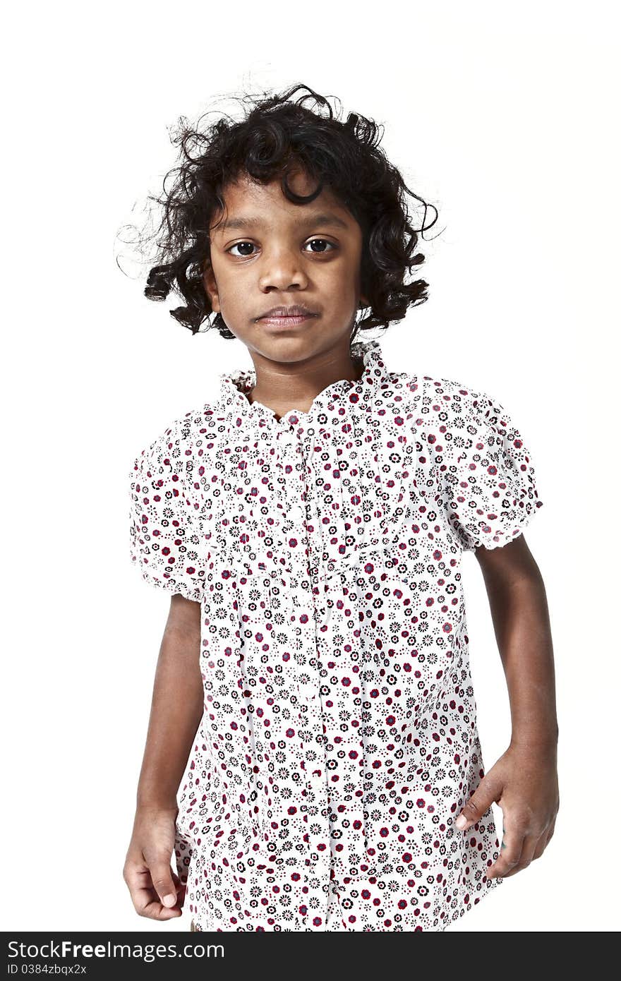 Portrait of little Indian girl on a white background