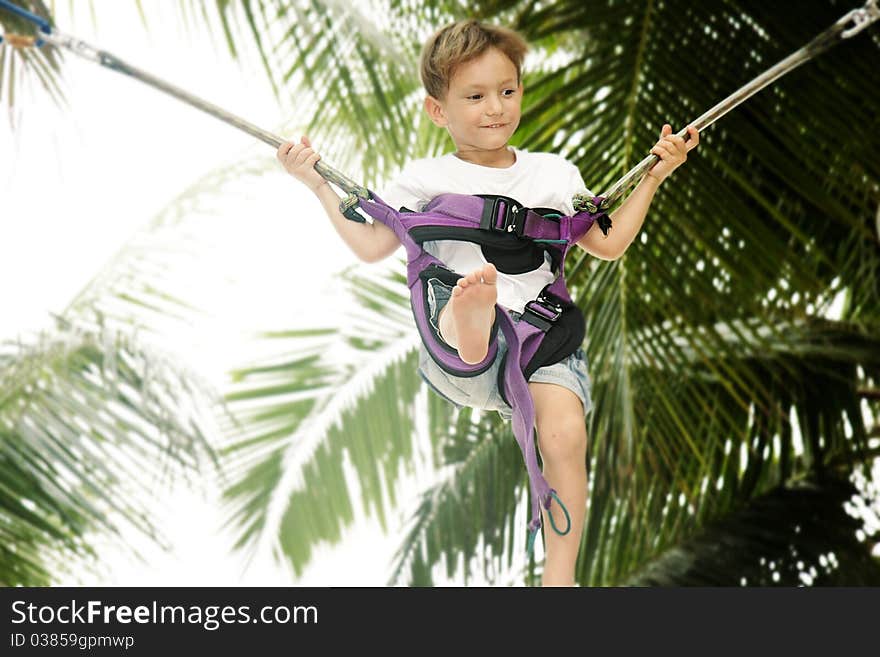 Young boy jumping bungee