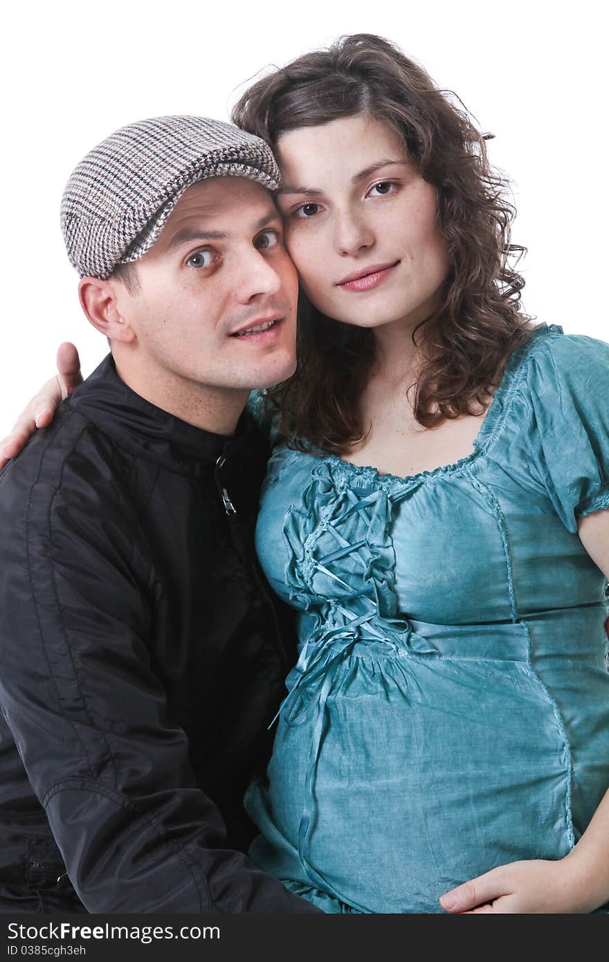 Happy family, parents waiting for a baby, woman siting on man lap