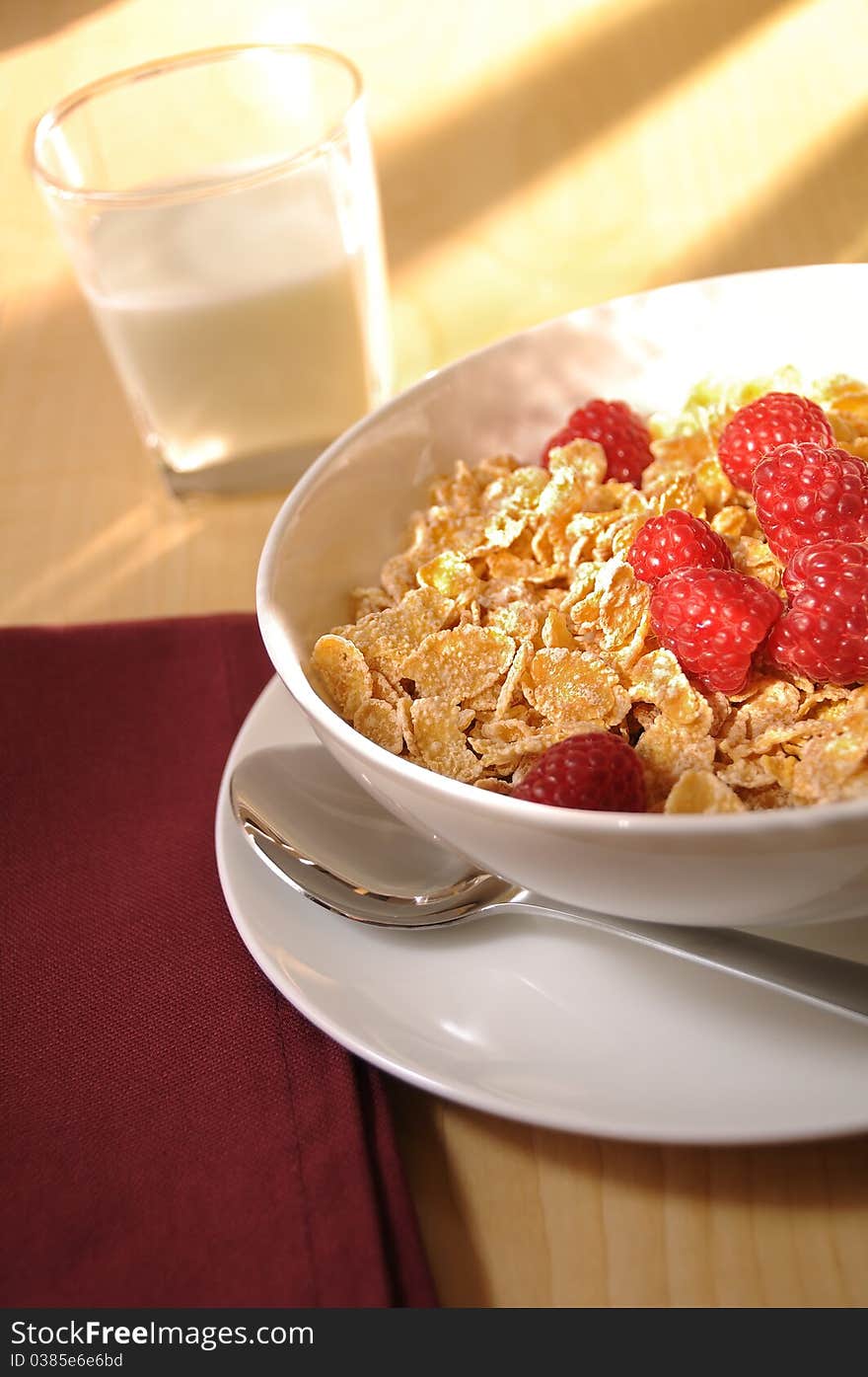 Wholesome breakfest servings of cereal, berries, and milk. Wholesome breakfest servings of cereal, berries, and milk