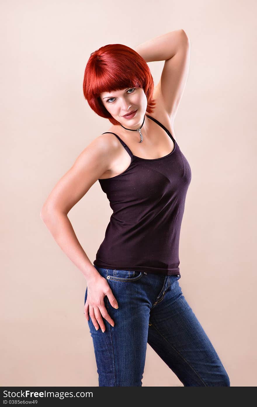 Portrait of the girl on a light grey background