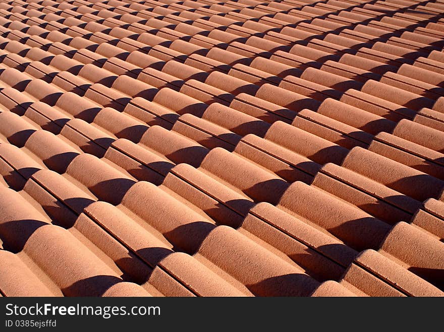 Red roof tiles pattern photo.