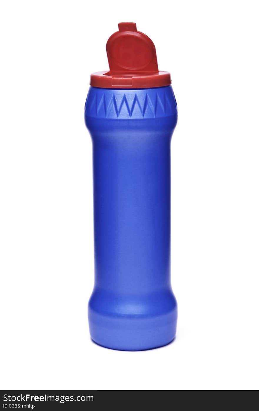 Dark blue plastic bottle on a light background. Dark blue plastic bottle on a light background