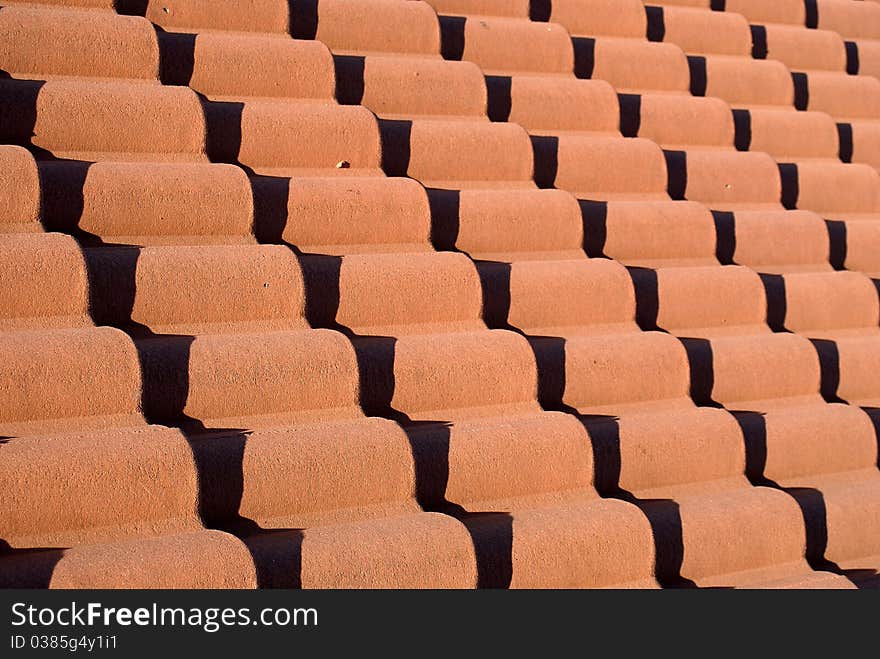 Red roof tiles pattern photo.