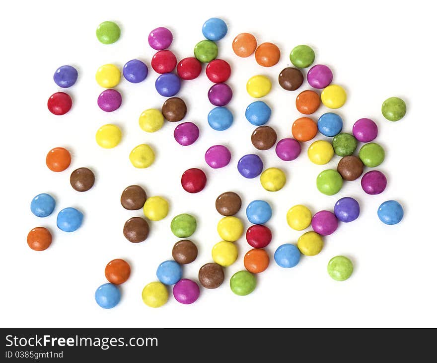 A lot of colorful sweets isolated on white background