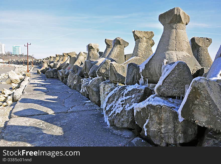 Walk on rocky dam in a cold winter morning. Walk on rocky dam in a cold winter morning