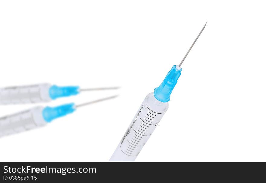 Medical syringe on a white background