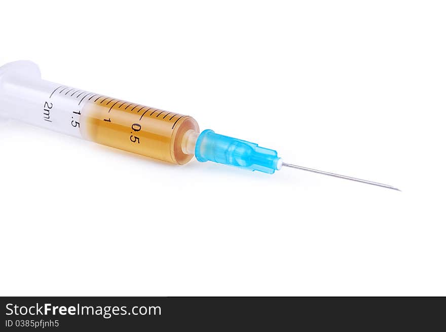 Medical syringe on a white background