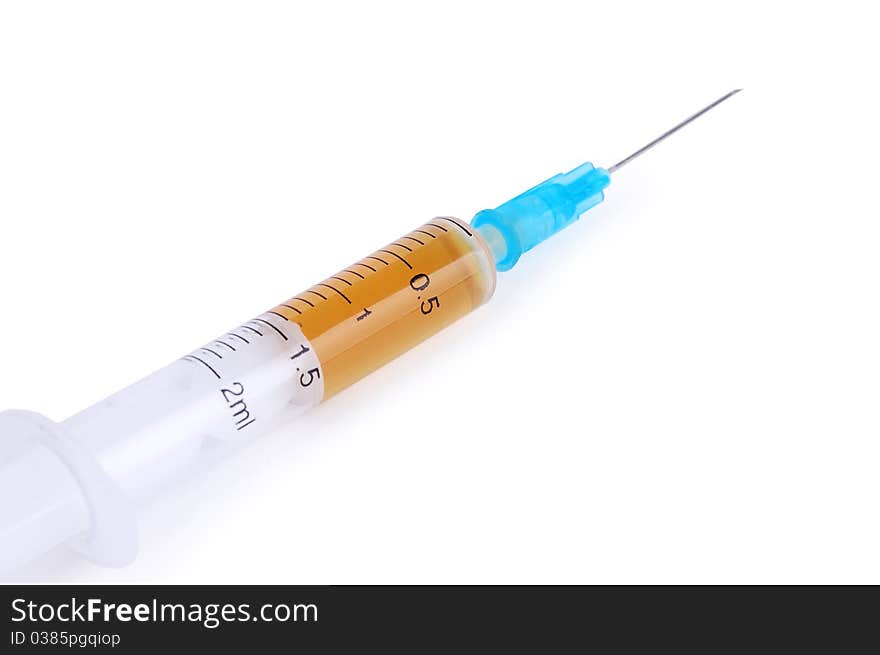 Medical syringe on a white background