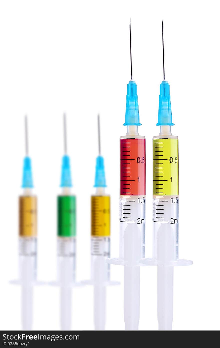 Medical syringe on a white background