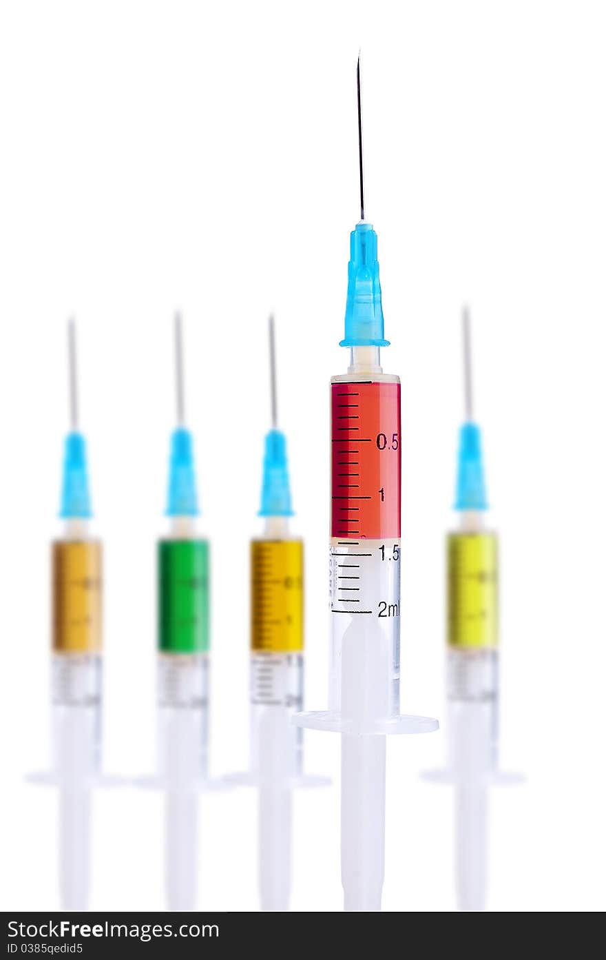 Medical syringe on a white background