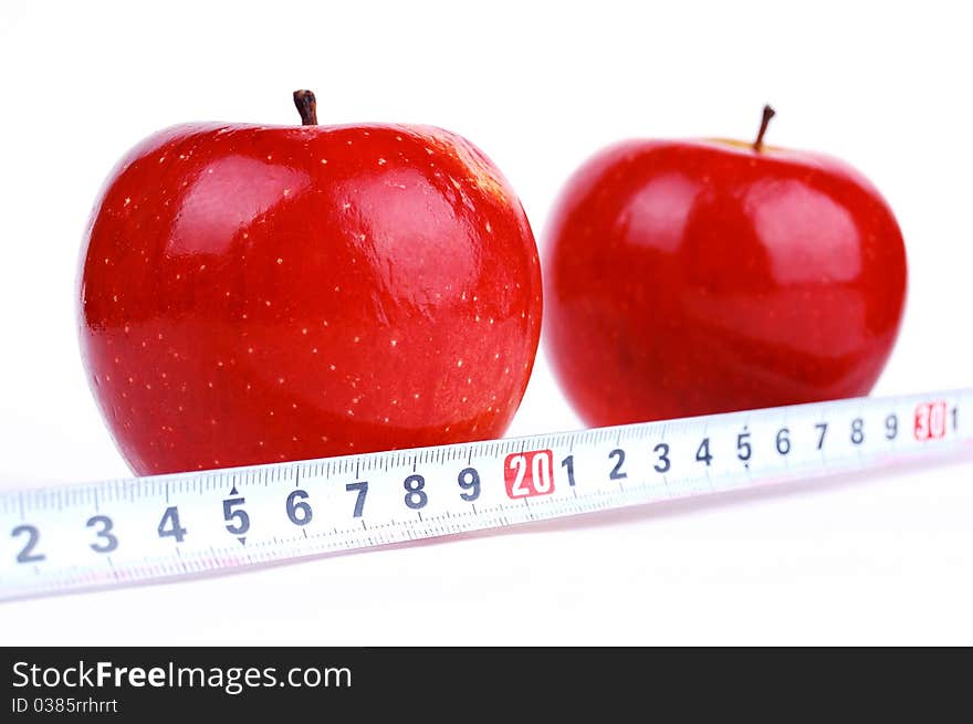 Red fresh apple on a white background