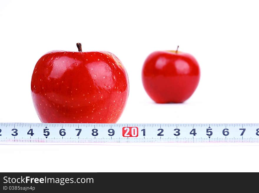 Red fresh apple on a white background