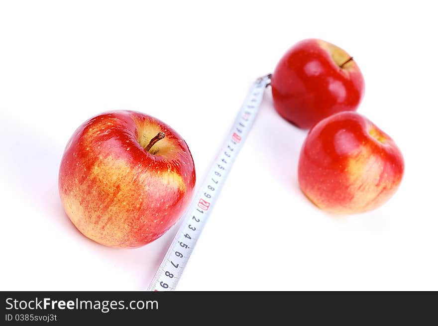 Red fresh apple on a white background