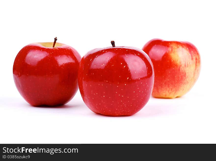 Red fresh apple on a white background