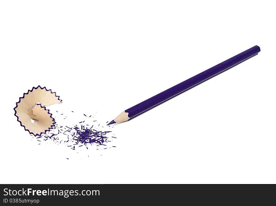 The undermined dark blue pencil and shaving isolated on a white background