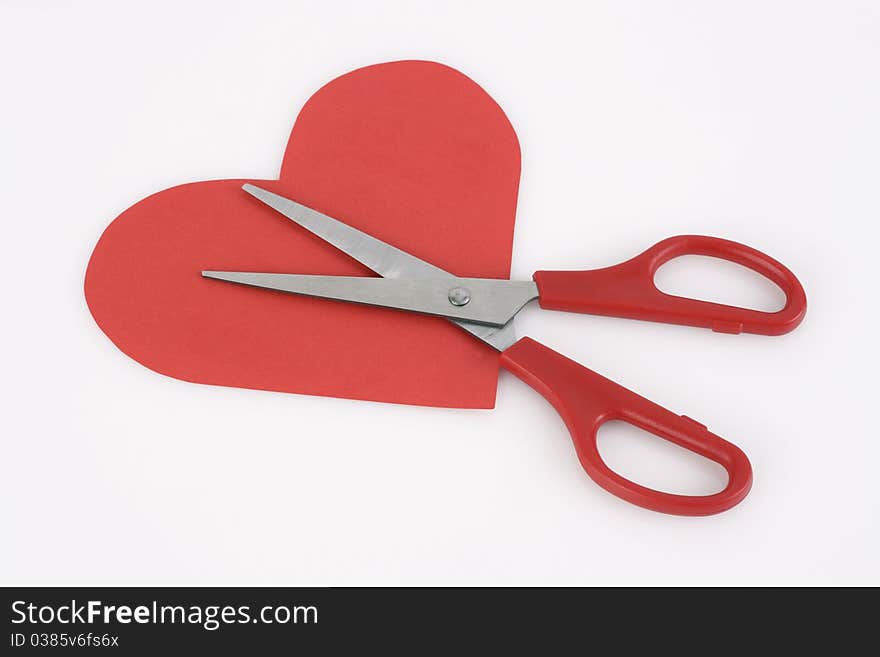 Red valentine heart and scissors