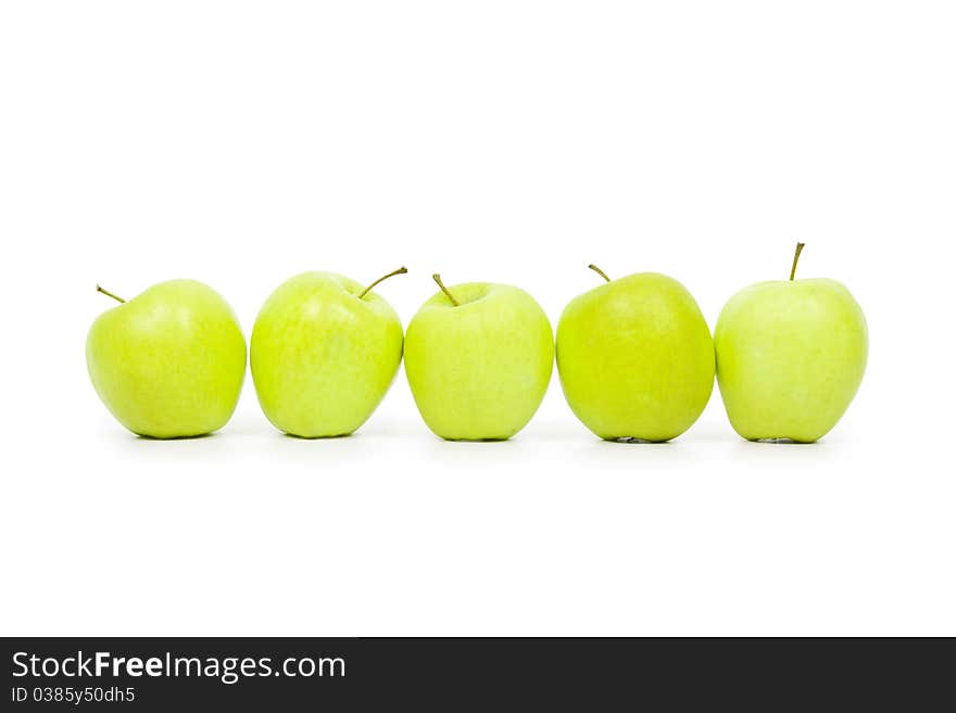 Green And Yellow Apples On A White Baclground