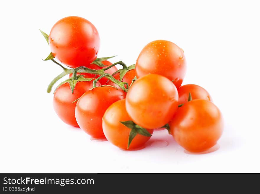 Contact red cherry tomatoes on a white background