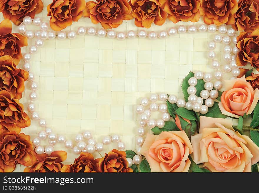 Frame from flowers on wooden background. Frame from flowers on wooden background