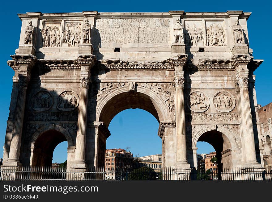 The Arch of Constantine is located between the Arch of Titus and the Circus Maximus near the colossuem