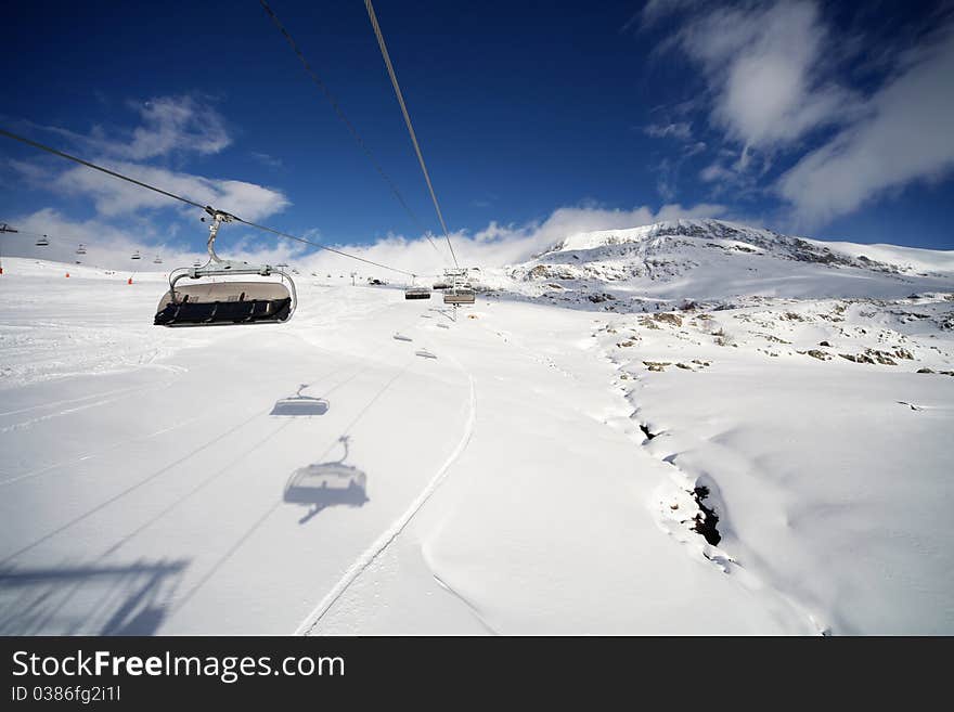 Ski slope after big dump of snow in Alpe d' Huez, France. Wide angle, photo taken 12.12.2010. Ski slope after big dump of snow in Alpe d' Huez, France. Wide angle, photo taken 12.12.2010.