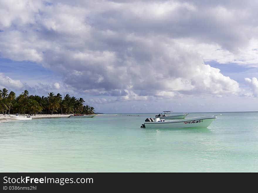 The boats near caribbean wild beach