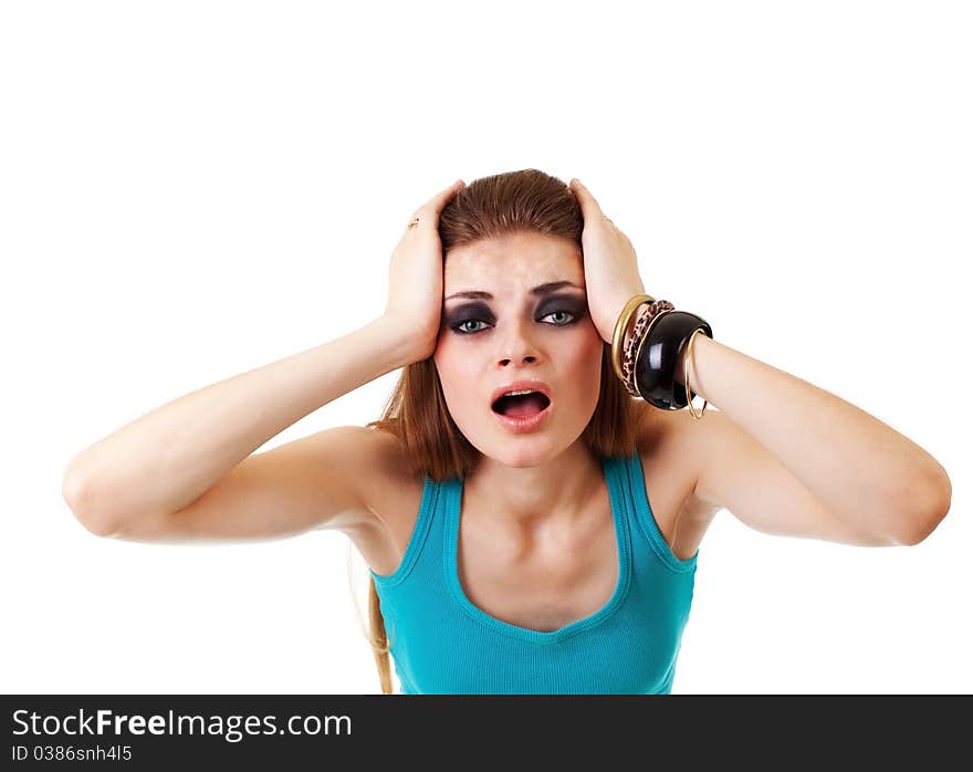 Girl in a dark makeup in blue T-shirt on white background with expression