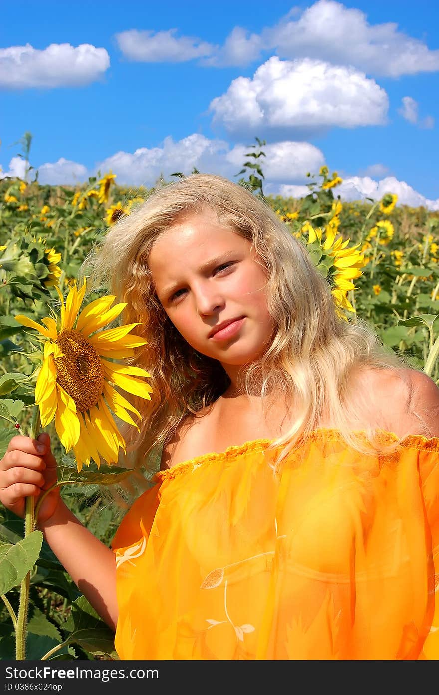 The girl and sunflowers