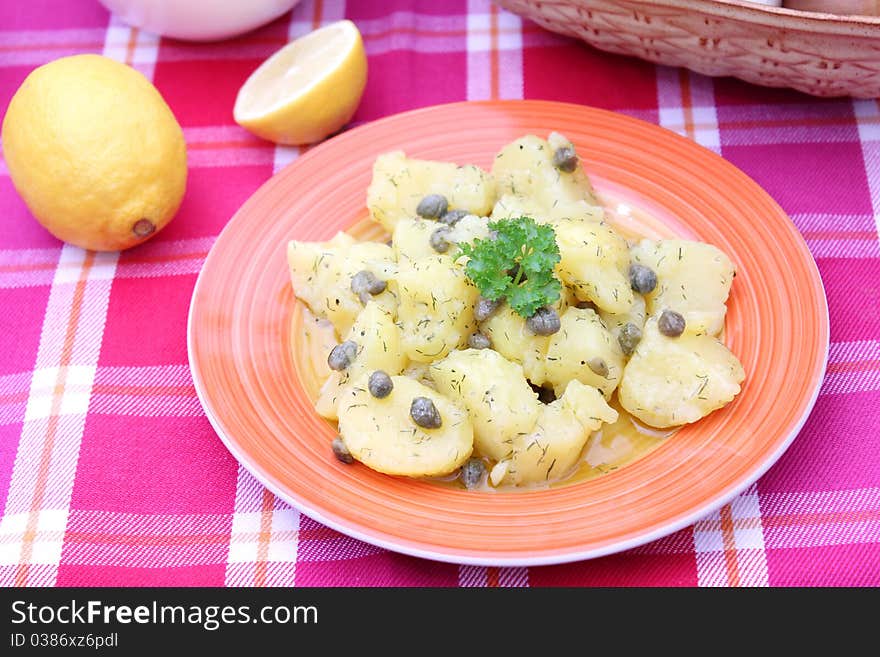 Fresh salad of potatoes on a plate