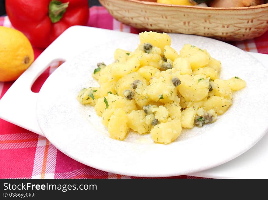 Fresh salad of potatoes on a plate