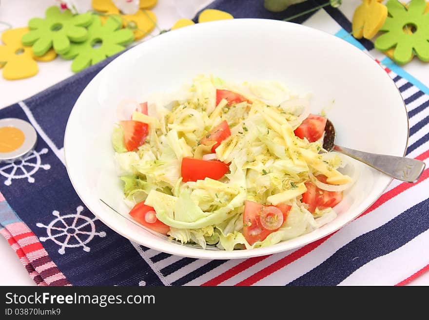 Fresh salad with tomatoes and cheese