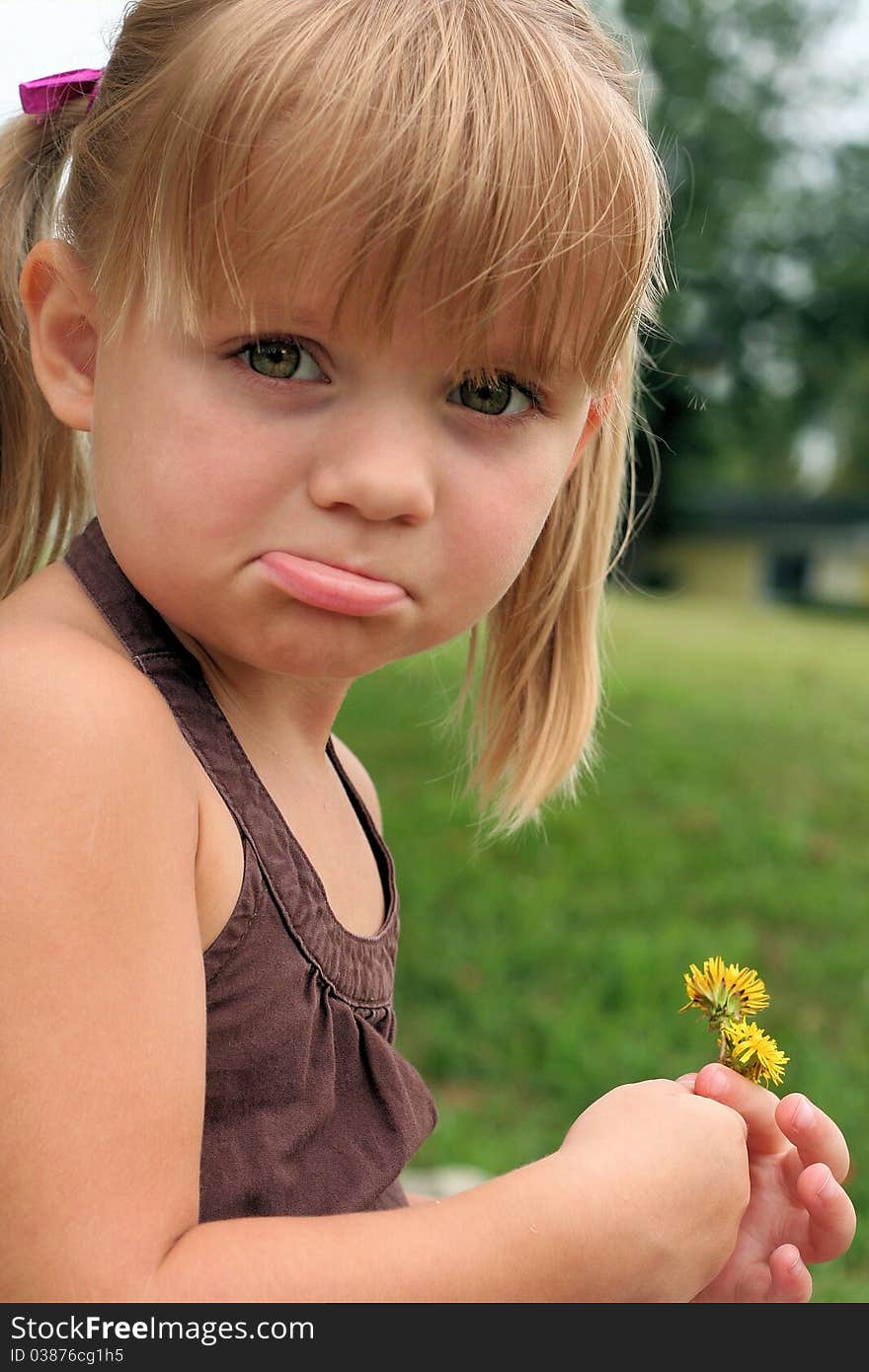 3 year old girl with a sassy frown!. 3 year old girl with a sassy frown!