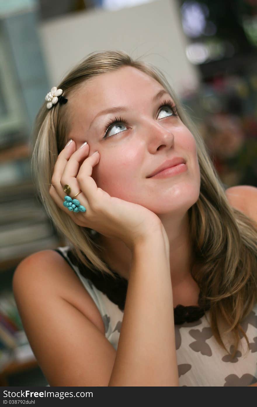 Portrait of a beautiful blonde woman with long hair and a smile