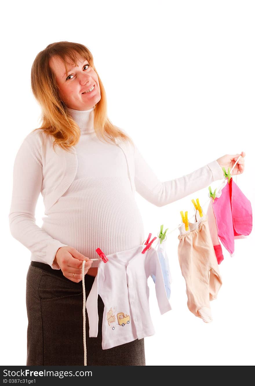 Beautiful pregnant woman staying on white background